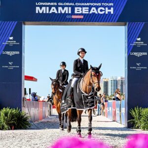 Georgina Bloomberg Instagram - It hasn’t been an easy road back to the winner’s circle. But making it back in on the beach, and with my favorite fan by my side, made it worth every moment. ☀️🌊💙🐴🌴 @longinesglobalchampionstour (📷: @sportfot.photovideo)