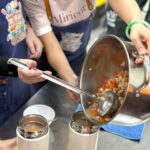 Gigi Lai Instagram - 今次我和同事去了工廠大廈內的惜食製作工場，用新鮮回收來的蔬菜，加上其他營養食材煲出湯水，從源頭開始善用資源，珍惜食物🥕，過程十分有意義。我們帶上熱湯和福袋探訪公公婆婆，這些關懷和陪伴的時光，都讓大家感到開心溫暖。無論是地球資源或是長者，珍惜和關愛都很重要💞 #gi_losophy #環保 #珍惜食物 #減少剩食 #食德好 #foodgrace #love #worldvolunteerday