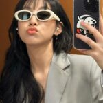 Gigi Yim Instagram - 🩶💛 Makeup: Stephen Lau Hair: Ziggie Law Stylist: Tang Lai Outfit: #McQueen 🕶️：@gentlemonster @maisonmargiela @puyioptical #maisonmargielaxgentlemonster