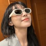 Gigi Yim Instagram - 🩶💛 Makeup: Stephen Lau Hair: Ziggie Law Stylist: Tang Lai Outfit: #McQueen 🕶️：@gentlemonster @maisonmargiela @puyioptical #maisonmargielaxgentlemonster