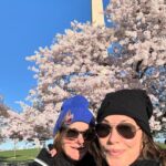 Gina Gershon Instagram - Early morning brisk walk with my sister and the cherry blossoms- is seemed so hopeful….….#spring #seestors #washingtonmonument 🌸🌸🌸🌸🌸