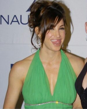 Gina Gershon Instagram - Happy St Patricks day to all you Leprechauns out there 🍀🍀🍀 (I do believe This is the Greenest dress I’ve ever worn )and thanks to @we_are_the_gemini for always finding these random photos !!#happystpatricksday💚💚💚