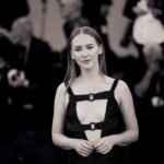 Gina Stiebitz Instagram - The dreamiest evening at the red carpet premier of ‘Poor Things‘ from Yorgos Lanthimos @labiennale Thank you @armanibeauty for having me 🌹 Picture: @ilushina_sasha #Makeup : @michalatus Hair: @valentinahstyle Outfit: @giorgioarmani #Venezia80 #Armanibeauty