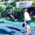 Gina Yashere Instagram - This epic #pickleball pic represents a bunch of things. That ball got past me on my backhand, but, I went for it anyway, executing a shot, which I just found out is called a '#tweener' 😂. Did the ball go over the net, to become the winning shot of the game? HELL NO 😂 But that sums up what my life & career have been. A series of false starts, small victories, rejections, & me aiming for goals that naysayers said I'd never reach. But I kept jumping, & eventually got one over the net, @bobheartsabishola, which has given me the confidence to jump even higher. I'm over 50 now, so the knees ain't gonna hold out much longer 😜 but I'm enjoying the journey. I'm working on some super exciting new projects, & I just booked a role on an epic show I can't talk about just yet, but guaranteed, you guys are gonna be BLOWN AWAY. Life is good. Tomorrow ain't promised, so I'm gonna live as much as I can TODAY. Thanx @angelaj.farmer for that epic shot. Thanx @oliviatravels for having the space for me to do 2 of my favourite things #standup & #pickleball And @ladygibraltar for the great games. If you're in LA, see you at @regenttheaterla on Aug 17th DON'T ASK ME SHIT!! ginayashere.com for deets The rest of you. See you on a TV screen somewhere in the very near future 😉