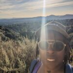 Gina Yashere Instagram - Being a London born city girl, I never gave a damn about nature, but as I get older and realize I've only got maybe 20 good summers left, if I'm lucky. (Thanx @deoncole 😜), I'm spending more time appreciating the simple things...and seeing things thru the eyes of these dogs, how excited they are about their short lives...I've realized I've become a FULL WHITE LESBIAN 🤣 A bitch is VOLUNTARILY HIKING 🤣
