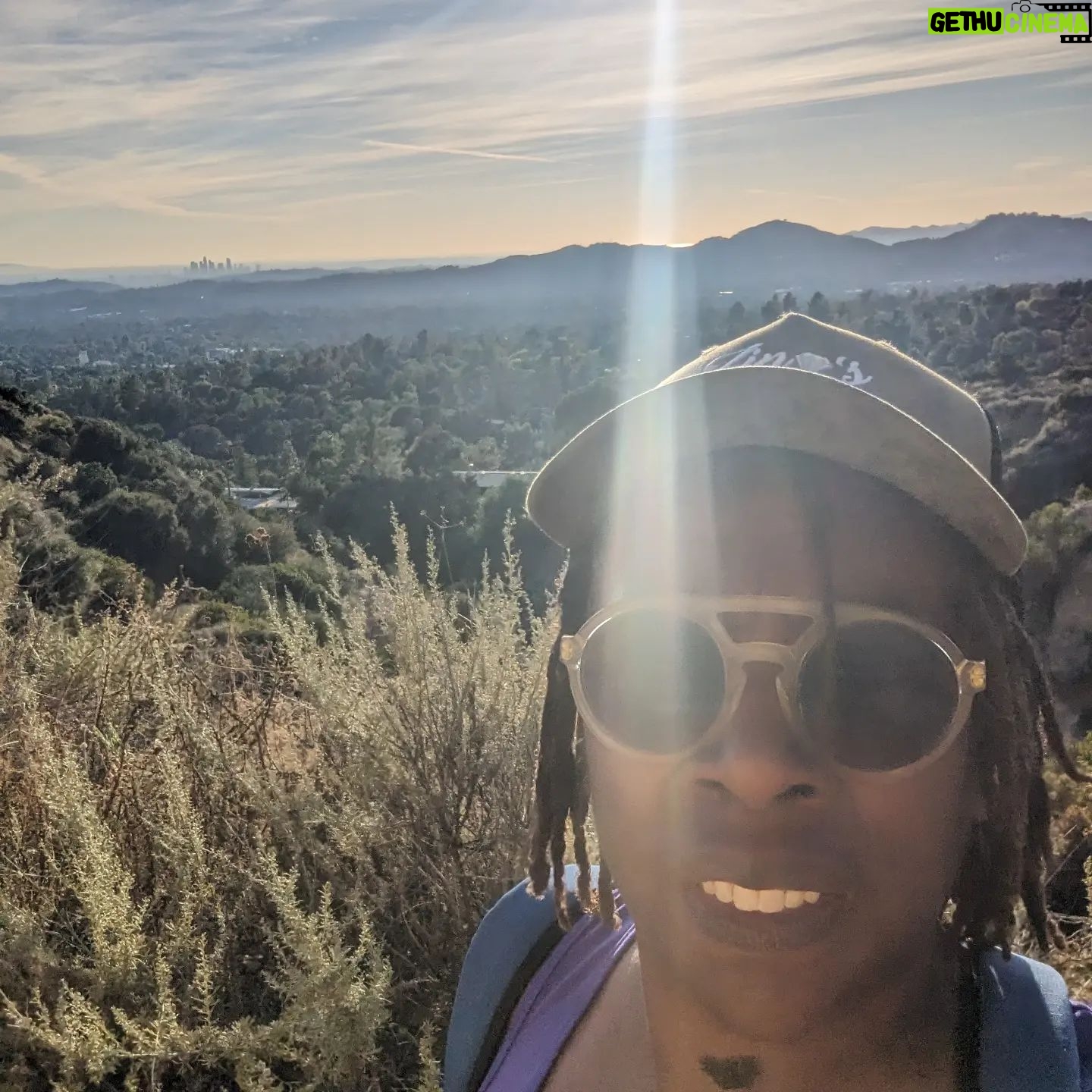 Gina Yashere Instagram - Being a London born city girl, I never gave a damn about nature, but as I get older and realize I've only got maybe 20 good summers left, if I'm lucky. (Thanx @deoncole 😜), I'm spending more time appreciating the simple things...and seeing things thru the eyes of these dogs, how excited they are about their short lives...I've realized I've become a FULL WHITE LESBIAN 🤣 A bitch is VOLUNTARILY HIKING 🤣