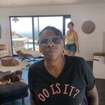 Gina Yashere Instagram - GIMME THE ARTIST! GIMME THE YEAR! BEFORE YOU ASK; #Choonsontuesdays tee a gift from superfan @djcarrielisa, but they'll be on sale on my website soon. 😜 GLASSES custom made by @gel_p_s My last #thewomankingofcomedy date is in LA this Saturday! GO GET YOUR TICKETS! DON'T ASK ME SHIT!! ginayashere.com for deets #choonsontuesdays #choonsontuesday #noshazam #under30sdontevenbother #thisaintyourgame