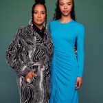 Golda Rosheuvel Instagram - Hanging with the gang @buzzfeed QC LA Wearing. @tovestudio COAT @dinosaur_designs RING / EARRINGS @esauyoriofficialpage DRESS @kalda_shoes BOOTS Style: @georgmedley Hair: @dionnesmithhair Makeup: @kennethsohmakeup