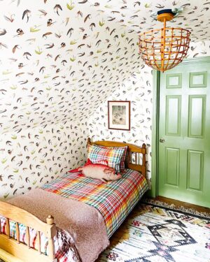 Gray Benko Instagram - If you’ve been watching our show on @magnolianetwork , you may have seen the episode where we went back to my dad’s childhood home to collect the bedroom furniture, art, and all of the many knick-knacks that he grew up with.  Charlie has this cute little room of of his bedroom that I have dubbed his “sleepover room”. Although none of his friends will ever sleep in it because they think it’s too scary (one of the stipulations that come with living in a 200  year old house). The room was really meant to be an ode to my dad and the time period when he grew up, complete with the old relics on full display, that I found stuffed in his bedroom drawers.  He’s probably going to be mad that I just called his things relics. Anywho, if you watch the episode, then you will also know that I gave the room a fishing theme as a way to poke a little fun at him because one time I found an old fishing scrapbook that he made, where he cut out magazine and newspaper images of fathers fishing with their sons.  My dad has always been a terrible fisherman and he told me that he made that scrapbook one day because he had always longed for his dad to teach home how to fish, but he never would.  So I proceeded to give this entire room a fishing theme, from the fishing lure wallpaper by @abnormalsanonymous, to the fishing net-reminiscent light by @straydogdesigns.  I even had @benkoman hand carve and paint a fish for me to mount the light fixture on.  Well, the day of filming rolls around and Grumpy decides to wait until the cameras are rolling to tell me that the entire story was made up. It was a school project and he’s always hated fishing.  So, I guess the joke was on me.  As usual.  At least I got a cute room out of it. The lesson here?  Grumpy is not to be trusted. 
Bedding by @annieselke
