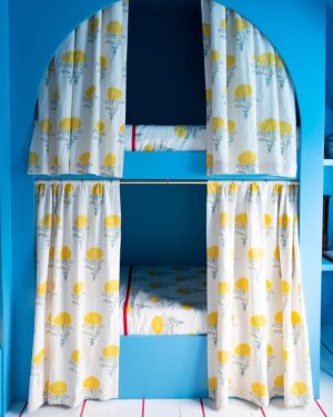 Gray Benko Instagram - We were recently lucky enough to work on one of the most iconic homes in our town, The Elizabeth Arden Home.  The third floor, which was once an attic space, allowed us to make some really fun design choices and I could not have been more pleased with the results!  That blue bunk room with the @mollymahonblockprinting fabric and painted floors has my heart.  Downstairs, in the formal entryway, the home owner really wanted a metallic wallpaper and @wallpaperie was able to create a beautiful custom chinoiserie for us.  And the icing on the cake, as always, was my all time favorite @straydogdesigns coming in hot with the incredible papier-mâché light fixtures.  I hope you were able to catch the episode and enjoyed it as much as we did (house fire and all 😱). 

New episode out tonight on @magnolianetwork !