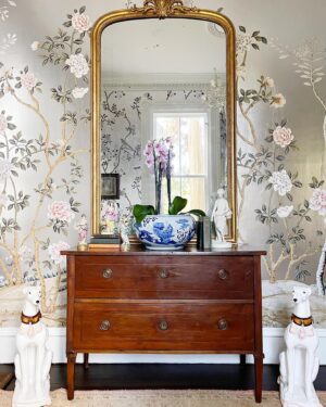 Gray Benko Instagram - We were recently lucky enough to work on one of the most iconic homes in our town, The Elizabeth Arden Home.  The third floor, which was once an attic space, allowed us to make some really fun design choices and I could not have been more pleased with the results!  That blue bunk room with the @mollymahonblockprinting fabric and painted floors has my heart.  Downstairs, in the formal entryway, the home owner really wanted a metallic wallpaper and @wallpaperie was able to create a beautiful custom chinoiserie for us.  And the icing on the cake, as always, was my all time favorite @straydogdesigns coming in hot with the incredible papier-mâché light fixtures.  I hope you were able to catch the episode and enjoyed it as much as we did (house fire and all 😱). 

New episode out tonight on @magnolianetwork !