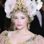 Haley Bennett Instagram – In honour of Met Gala “Garden in Time” 
I would like to share a look from years ago 
that perfectly suits this years theme 🌸 Dolce made this custom dress for me styled by mega @highheelprncess
My dear friend and confidant @garrennewyork made the look with this incredible hairstyle and hand made headpiece he piled on top my head, the whole look was kept fresh by the one and only @alice___lane 
I felt like a porcelain goddess. I also drank way too much champagne that night, cried over a boy I once loved who very much hurt me, and then blacked out. 
Luckily I didn’t drown in the bottom of a glass of bubbles. Cue Florence and the Machine. 
I’m not good at these big events. And I was never invited back! 
Can’t wait to see all the fabulous looks that the stars and their stylist dream up. “Garden of Time” is right up my street. I could lay in my meadow, and watch wild flowers dance all day. What a life.