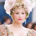 Haley Bennett Instagram – In honour of Met Gala “Garden in Time” 
I would like to share a look from years ago 
that perfectly suits this years theme 🌸 Dolce made this custom dress for me styled by mega @highheelprncess
My dear friend and confidant @garrennewyork made the look with this incredible hairstyle and hand made headpiece he piled on top my head, the whole look was kept fresh by the one and only @alice___lane 
I felt like a porcelain goddess. I also drank way too much champagne that night, cried over a boy I once loved who very much hurt me, and then blacked out. 
Luckily I didn’t drown in the bottom of a glass of bubbles. Cue Florence and the Machine. 
I’m not good at these big events. And I was never invited back! 
Can’t wait to see all the fabulous looks that the stars and their stylist dream up. “Garden of Time” is right up my street. I could lay in my meadow, and watch wild flowers dance all day. What a life.