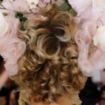 Haley Bennett Instagram – In honour of Met Gala “Garden in Time” 
I would like to share a look from years ago 
that perfectly suits this years theme 🌸 Dolce made this custom dress for me styled by mega @highheelprncess
My dear friend and confidant @garrennewyork made the look with this incredible hairstyle and hand made headpiece he piled on top my head, the whole look was kept fresh by the one and only @alice___lane 
I felt like a porcelain goddess. I also drank way too much champagne that night, cried over a boy I once loved who very much hurt me, and then blacked out. 
Luckily I didn’t drown in the bottom of a glass of bubbles. Cue Florence and the Machine. 
I’m not good at these big events. And I was never invited back! 
Can’t wait to see all the fabulous looks that the stars and their stylist dream up. “Garden of Time” is right up my street. I could lay in my meadow, and watch wild flowers dance all day. What a life.