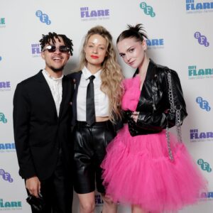 Hallea Jones Instagram - Coco’s manic panic pink hair made its world premiere in WE FORGOT TO BREAK UP at @britishfilminstitute Flare Festival on Sunday! What an honour to have our queer indie Canadian film be presented in the UK at such an iconic queer festival. Truly a week to remember. Thanks so much for having us!! 

Also can we have a moment for the dress?! @spacevintagexo provided YET AGAIN a stellar premiere dress and I’ll be honest I judged HARD when I saw it on the rack but it was such an obvious done deal once I put it on. Coco is GO BIG OR GO HOME with her hot pink hair so I knew I had to honour her with something just as daring on premiere night💞🌸

WE FORGOT TO BREAK UP is premiering in North America soon but where….? That is a secret for now 🤫😏