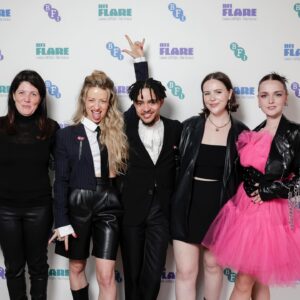 Hallea Jones Instagram - Coco’s manic panic pink hair made its world premiere in WE FORGOT TO BREAK UP at @britishfilminstitute Flare Festival on Sunday! What an honour to have our queer indie Canadian film be presented in the UK at such an iconic queer festival. Truly a week to remember. Thanks so much for having us!! 

Also can we have a moment for the dress?! @spacevintagexo provided YET AGAIN a stellar premiere dress and I’ll be honest I judged HARD when I saw it on the rack but it was such an obvious done deal once I put it on. Coco is GO BIG OR GO HOME with her hot pink hair so I knew I had to honour her with something just as daring on premiere night💞🌸

WE FORGOT TO BREAK UP is premiering in North America soon but where….? That is a secret for now 🤫😏