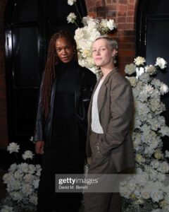 Hannah van der Westhuysen Instagram - Fashunably late to this as always🕺🏼 thank you for the gorgeous date night with @preciousmustaph 🪩 @vogue @netflix @bafta Hair by brilliant @linocarbosiero & colour @hairbynadiafariah Suit by @velanche @cldstyle