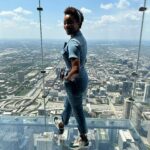 Heather Headley Instagram - I’m on top of the world…hey! And please, don’t let the smile fool you, there was prayer and fasting before I stepped onto that thing. And you can’t hear our kids giggling that they got me to do it. It’s amazing though….