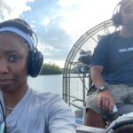 Heather Headley Instagram – We took a quick family trip, and my husband thought it would be fun (and somewhat romantic…) to visit the #everglades. It WAS fun! I loved it!  However, as I got settled in, and started our trip into the marsh, our guide’s first words were…
‘Now, if a snake falls into this boat, don’t jump out! Throw it out. Take a selfie with it. Hand it to me. Do whatever. But DON’T. JUMP. OUT!!!’
😳! 
I looked at him and thought,
You must be crazy (as his shirt may suggest…),
If a snake falls in this boat, let’s see how fast I jump right out and walk on this water to get out of here…
Until…
…
I saw what else was in the water with us! 
😐
I guess…my choice would be the selfie. #saycheese #alligator vs #snake 

#besttime #best #captain #dontcare
#havemercy
#happysunday