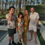 Heather McDonald Instagram - Slide Right. I Had a 1970 themed Palm Springs party last night. I got this dress b/c I knew it would pair perfectly with my sister’s. Shannon is wearing our mom’s dress from the early 1970s. How cute is my daughter in @trinaturk More pics and videos to come. No filter or photo shop on these FYI @goldstein.shannon @kraftmackncheese @deniseaustin @thebrandyhoward #palmsprings #laquinta #party #cocktails #pool #palmtrees #memorialday #1970s #eveningdress #juicyscoop #heathermcdonald @shophelsi is my dress