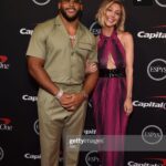 Heidi Gardner Instagram - ESPYS 2022 /// styled by @shea.daspin dress @moschino makeup @jennakristina hair @josephmaine @jenmeyerjewelry @gabrielandco two Super Bowl champs 💕💕 @killatrav @aarondonald99 power date @kerip4eva