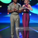 Heidi Gardner Instagram - ESPYS 2022 /// styled by @shea.daspin dress @moschino makeup @jennakristina hair @josephmaine @jenmeyerjewelry @gabrielandco two Super Bowl champs 💕💕 @killatrav @aarondonald99 power date @kerip4eva