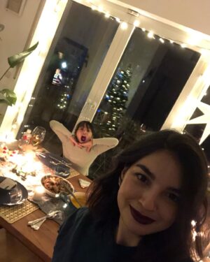 Helga Krapf Instagram - A Family of two. 👩‍👧❤️ First time that we spent Christmas this way, just me and her. We bonded over wrapping Lumpia, cooking, decorating the table, and the desserts. After praying, Amelie immediately started serving herself some pumpkin soup and said “Good job Mommy for cooking all of this by yourself, I love it.” 😭😭😭 

Beyond thankful for how blessed I am to get to raise this child, the gift that keeps on giving. Merry Christmas from our little imperfectly perfect family to yours. 🌟