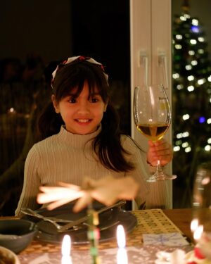 Helga Krapf Instagram - A Family of two. 👩‍👧❤️ First time that we spent Christmas this way, just me and her. We bonded over wrapping Lumpia, cooking, decorating the table, and the desserts. After praying, Amelie immediately started serving herself some pumpkin soup and said “Good job Mommy for cooking all of this by yourself, I love it.” 😭😭😭 

Beyond thankful for how blessed I am to get to raise this child, the gift that keeps on giving. Merry Christmas from our little imperfectly perfect family to yours. 🌟