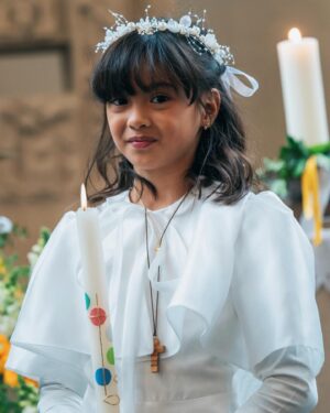 Helga Krapf Instagram - Another milestone: Amelie’s first holy communion. 🙏🏼 She was so excited for this and was so kilig to finally get to try that “white thing” mommy always eats in mass. 🙈😆😅

Made sure she got a piece of home with her by letting her wear a custom made Filipiniana inspired @thehouseofenchante dress. She looked like a little priestess 😍 Her candle is from Portugal, blessed at Our lady of Fatima which we then designed together using wax paper. The cake was made by me with the help of @puratosph 🤭 Only the best for my little miss. 👧🏻 

Thank you to our family and friends, and to those who helped make this happen. ☺️

To Amelie, Congratulations on your first holy communion. May God bless and protect you always my love. Love you to the moon and back. 🥰🙏🏼