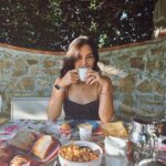 Helga Krapf Instagram - Been planning to post this photo for so long but kept on delaying it because I wanted the caption to be something inspiring and meaningful because…Virgo. 😅 Honestly, I love this photo because it allows me to time travel into the future. I can imagine my future grandchildren looking at old photographs of their „Omi Helga“ as they talk about the small things like how she loved breakfast food, red lips, vintage things and also the bigger ones: the life she had lived, the struggles she overcame, the silent battles she fought, her healing journey, and hopefully laughter, love, and light that she brought to people around her. ☀️🛵💋🥞 Remember that long after your physical body has left this life behind, there’s a mark you leave in peoples lives that has the power to inspire your loved ones long after you’re gone. So make the most out of the life you are living in the present. ❤️‍🔥 PS. I think I haven’t posted a static photo for some time to the point where I was so confused about the new IG settings and how to post. 🤣 Definitely feel like I‘m getting too old for this. 😅