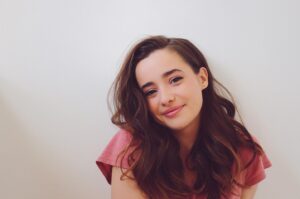 Holly Earl Instagram - Hope everyone’s doing okay staying inside! Today I did my hair and makeup for the first time in a while... my usual quarantine look consists of chocolate covered chops, a top knot and a dusting of Pringle crumbs 👵