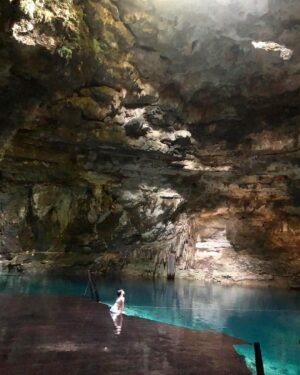 Holly Earl Instagram - 🇲🇽 Stumbled upon this cenote and it was completely empty! There was a hole in the top letting in sunlight and bats flying around🦇 One of the most amazing places I’ve ever been 💫