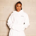 Imani Lewis Instagram - VERSATILITY🤌🏾🤍🖤🤍These unisex “Certified Bandit” Pullover Hoodies are SOOO comfortable and can be swagged so many different ways!! Which look do yall like better?!?👀🤍🖤Shop with the link in my bio!!🥷🏾 📸: @vp.trey