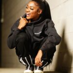 Imani Lewis Instagram - VERSATILITY🤌🏾🤍🖤🤍These unisex “Certified Bandit” Pullover Hoodies are SOOO comfortable and can be swagged so many different ways!! Which look do yall like better?!?👀🤍🖤Shop with the link in my bio!!🥷🏾 📸: @vp.trey
