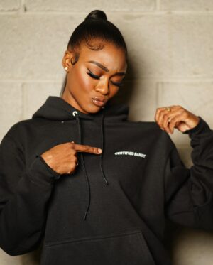 Imani Lewis Instagram - VERSATILITY🤌🏾🤍🖤🤍These unisex “Certified Bandit” Pullover Hoodies are SOOO comfortable and can be swagged so many different ways!! Which look do yall like better?!?👀🤍🖤Shop with the link in my bio!!🥷🏾
📸: @vp.trey