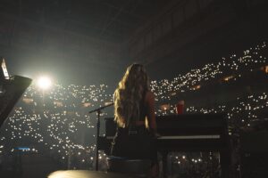 Ingrid Andress Instagram - last night was incredible for so many reasons. 1. @kelseaballerini broke the Thompson Boling Arena record for female country artists in ticket sales. And also put on a damn good show that showed her talent as well as her beautiful vulnerability. 
2. @itsgeorgiawebster and I got to sing with her and it was magical.
3. I got to play for you wonderful people and felt so welcomed into the space. Thank you Kelsea for being such a light, and thank you all for turning on your lights 🫶🏼Last photo is how I feel on the inside always 

📷 @kirstenbalani