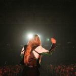 Ingrid Andress Instagram - last night was incredible for so many reasons. 1. @kelseaballerini broke the Thompson Boling Arena record for female country artists in ticket sales. And also put on a damn good show that showed her talent as well as her beautiful vulnerability. 2. @itsgeorgiawebster and I got to sing with her and it was magical. 3. I got to play for you wonderful people and felt so welcomed into the space. Thank you Kelsea for being such a light, and thank you all for turning on your lights 🫶🏼Last photo is how I feel on the inside always 📷 @kirstenbalani