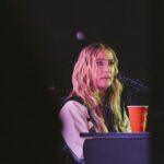 Ingrid Andress Instagram - last night was incredible for so many reasons. 1. @kelseaballerini broke the Thompson Boling Arena record for female country artists in ticket sales. And also put on a damn good show that showed her talent as well as her beautiful vulnerability. 2. @itsgeorgiawebster and I got to sing with her and it was magical. 3. I got to play for you wonderful people and felt so welcomed into the space. Thank you Kelsea for being such a light, and thank you all for turning on your lights 🫶🏼Last photo is how I feel on the inside always 📷 @kirstenbalani