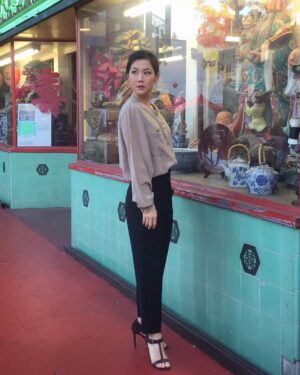 Irene Choi Instagram - Turns out they don't have Panda Express in Chinatown
.
.
📸: @hanksterchen 
Outfit: vintage silk blouse (thrifted $2), @hm earrings ($2), @charlesdavidshoes (def not $2)