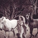 Isabel Lucas Instagram - My sister and I watched an unreal amount of horse movies growing up. All the classics; National Velvet, The Silver Brumby, The horse Whisperer, The Black Stallion, Pharlap, Spirit, The Man From Snowy River, the list goes on. I’ve been following the powerful work of @kindfarmhorserescue. They’re a small, local (to me) organisation that re-homes horses in risk of slaughter, like older mistreated horses and ex-racehorses. It’s moving to witness the evolution and healing, the light returning in their eyes and even their trust, playfulness restored when they find their a safe and healthy home. It reminds me of another childhood film; Black Beauty. You can support them here @kindfarmhorserescue Pictures from a few years back by @arterium with horses from @theranchbyronbay for ‘Sisters of Substance'. Bless you @arterium #thekindfarm #horsehealing #healinghorses