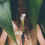 Isabel Lucas Instagram - Repost @atone.beauty ・・・ ‘In a world that whirls ever faster, the sensitive being tirelessly believe that they need to tend to everyone else’s needs much more than their own. They weave a beautiful tapestry for everyone around them, yet their own threads quietly fray in the background.’ ‘Now is the time to cradle yourself with the same love that you so freely give…’ ‘To be reminded that in this previous life, your self-care moments are not a luxury, but a sacred duty.’ ‘My skincare rituals with Atone’s botanical elixirs are a big part of self-care for me, and I’m so honored to share them with you.’ - ATONE.CO ༄ Photo by @raynjermain Florals by @anamundistudio