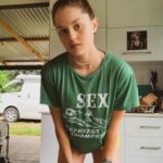 Isabelle Cornish Instagram - My mum always used to wear cheeky shirts. I remember one day she picked me up from school in a f*** shirt. That featured 100 different f*** words, but move your body it’s good for your health ❤️