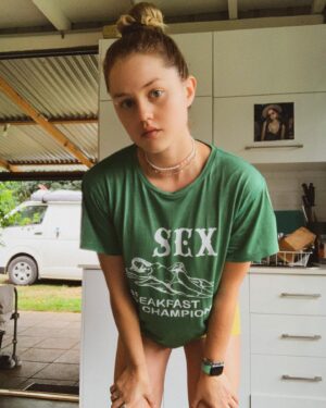 Isabelle Cornish Instagram - My mum always used to wear cheeky shirts. I remember one day she picked me up from school in a f*** shirt. That featured 100 different f*** words, but move your body it’s good for your health ❤️