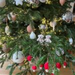 Ivana Miličević Instagram - Our #Christmastree this year! Mama and I wrapped some balls with string and crocheted some chains to wrap around others. Swipe to see close Ups. Also, the mushroom patch is how Phoenix hangs his ornaments every year. All in one place. I live. That is how mushies grow. #bohochic #bohochristmas