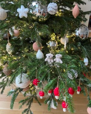 Ivana Miličević Instagram - Our #Christmastree this year! Mama and I wrapped some balls with string and crocheted some chains to wrap around others. Swipe to see close Ups. Also, the mushroom patch is how Phoenix hangs his ornaments every year. All in one place. I live. That is how mushies grow. #bohochic #bohochristmas