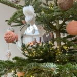 Ivana Miličević Instagram - Our #Christmastree this year! Mama and I wrapped some balls with string and crocheted some chains to wrap around others. Swipe to see close Ups. Also, the mushroom patch is how Phoenix hangs his ornaments every year. All in one place. I live. That is how mushies grow. #bohochic #bohochristmas