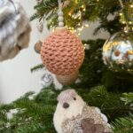 Ivana Miličević Instagram - Our #Christmastree this year! Mama and I wrapped some balls with string and crocheted some chains to wrap around others. Swipe to see close Ups. Also, the mushroom patch is how Phoenix hangs his ornaments every year. All in one place. I live. That is how mushies grow. #bohochic #bohochristmas