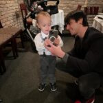 Jaclyn Glenn Instagram - Throwback to Asher taking his first photo! We may be a little off-center, but the look on his face was all worth it. Perfect! 📸 1st photo ➡️ the result! 2nd ➡️ David explaining the button 3rd ➡️ “are you sure?” 4th ➡️ “ok here I go!” 5th ➡️ him taking a picture of me taking a picture of him taking a picture lol 6th ➡️ “OMG I DID IT HOW COOL!!” ♥️ 7th ➡️ us with sleeping Violet behind us :)
