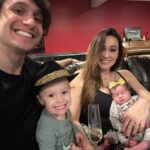 Jaclyn Glenn Instagram - 2023 was good to us ✨🥂✨ Happy new year from 2 tired parents and 2 adorable littles 💛