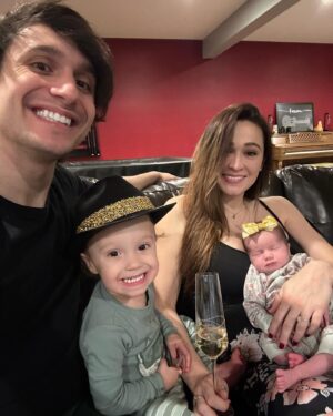 Jaclyn Glenn Instagram - 2023 was good to us ✨🥂✨ Happy new year from 2 tired parents and 2 adorable littles 💛